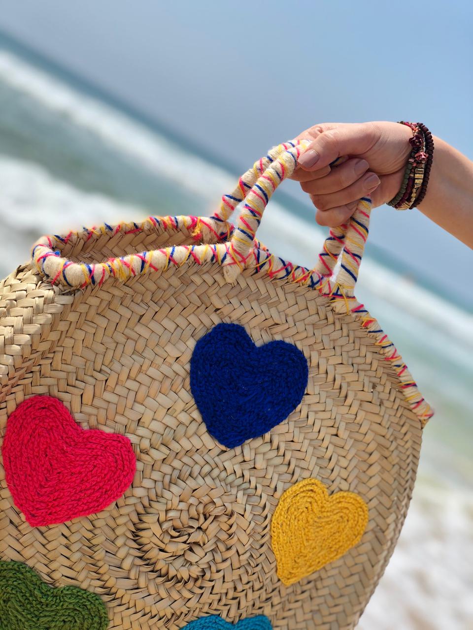 Handwoven Round Moroccan Straw Bag with Colorful Hearts | Handmade Palm Leaf Beach Tote | ArtisanNomad